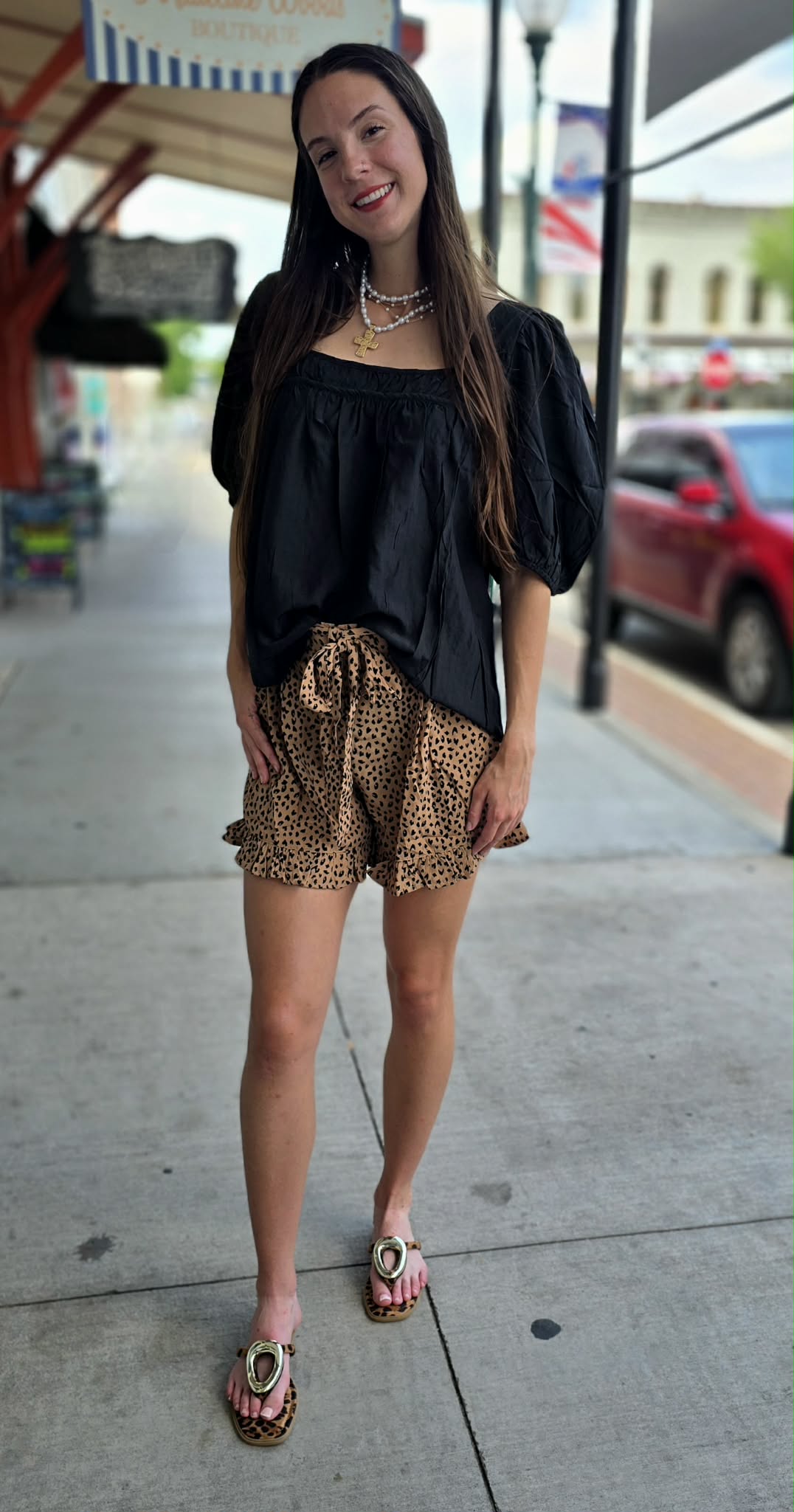 Tan and black animal print shorts