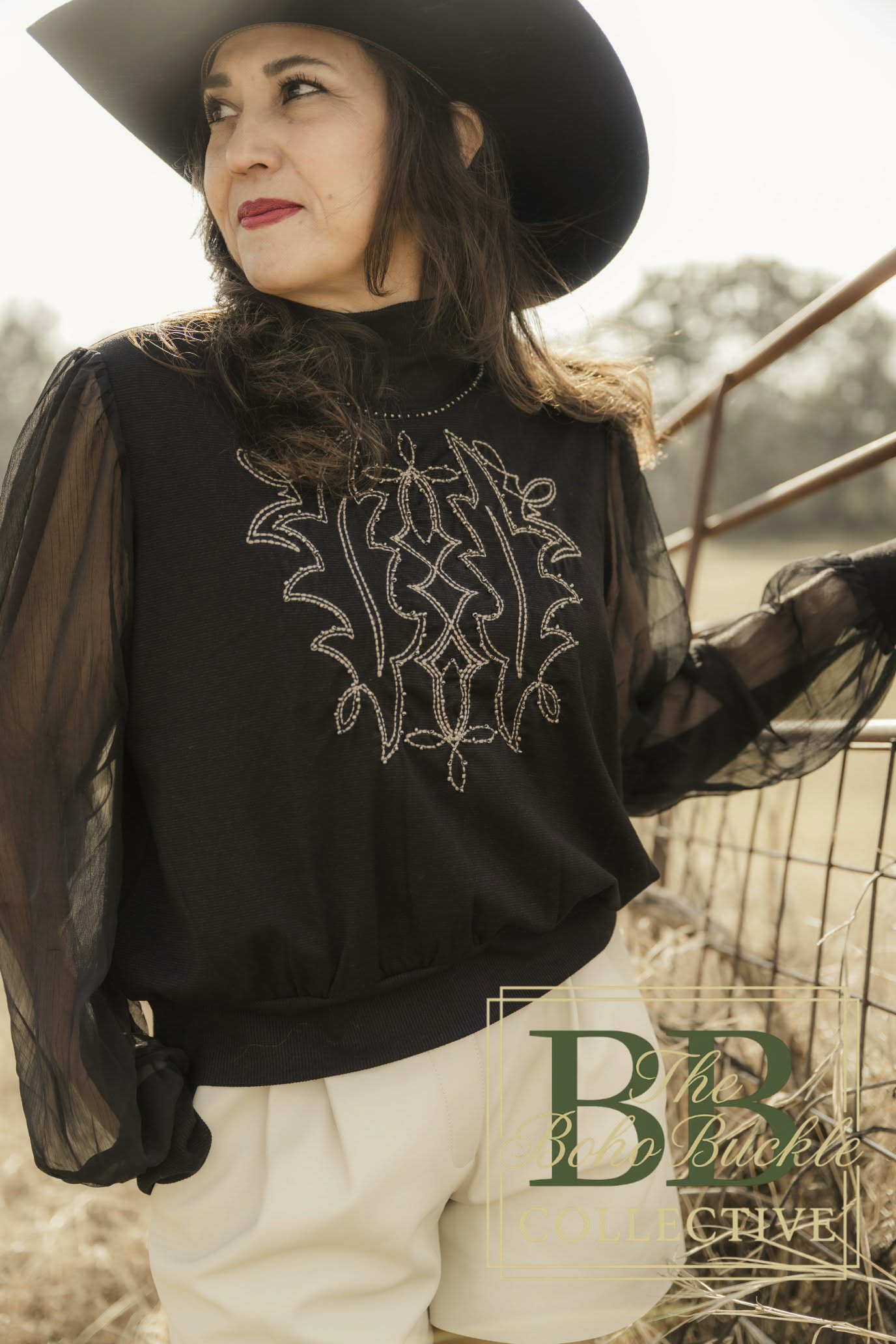 Black boot stitch blouse