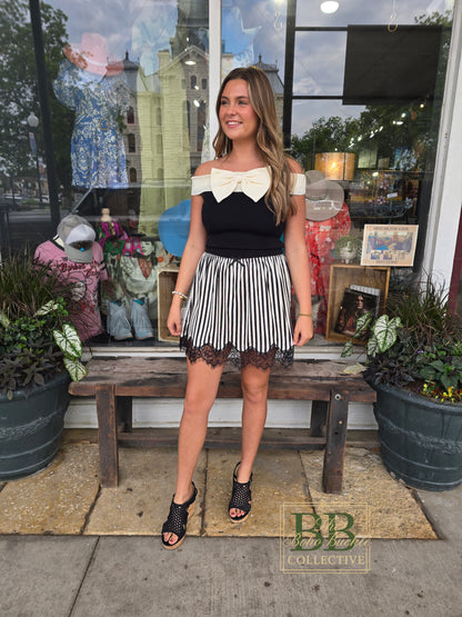 Black and white bow top