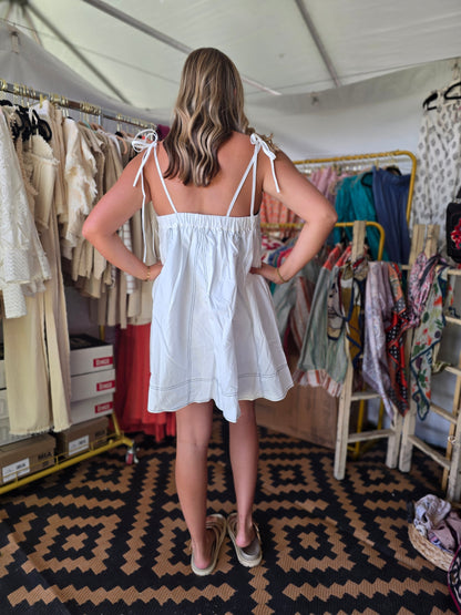 White sundress with black stitching